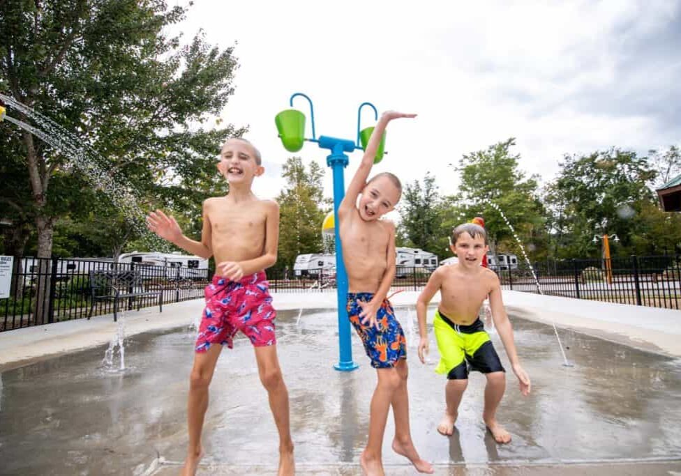 Kids playing on splash pad Kids playing on splash pad